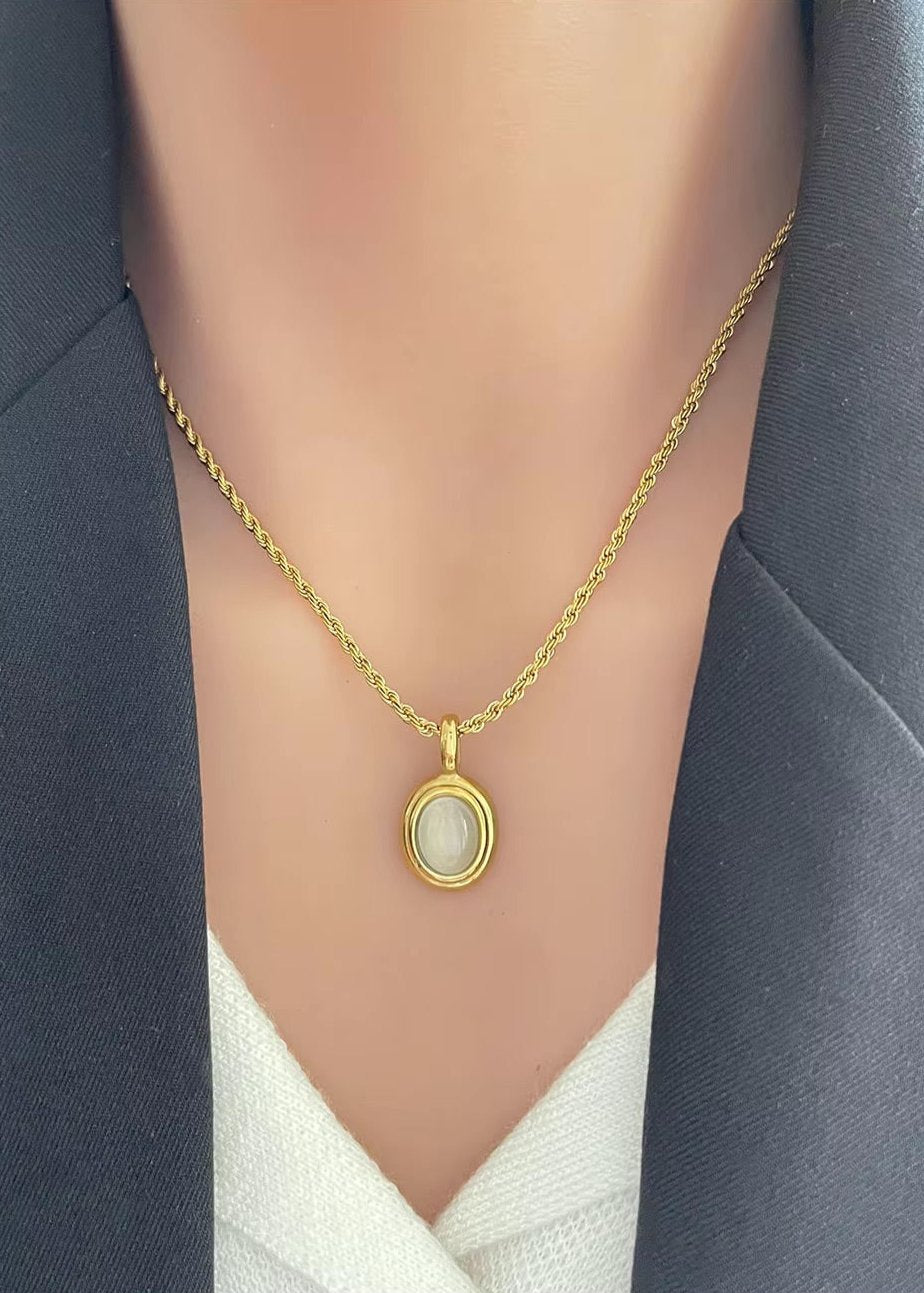 18K gold plated oval pendant necklace in stainless steel with minimalist design, perfect for layering or everyday wear.