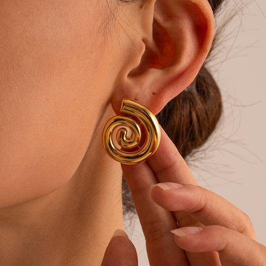 Stylish and minimalist 18K gold-plated geometric spiral stud earrings crafted from durable stainless steel, adding a touch of modern elegance to your ensemble.