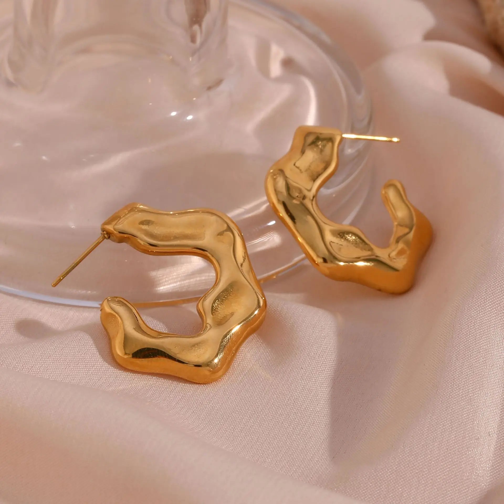 Chunky C-shaped abstract flower stud earrings stainless steel design