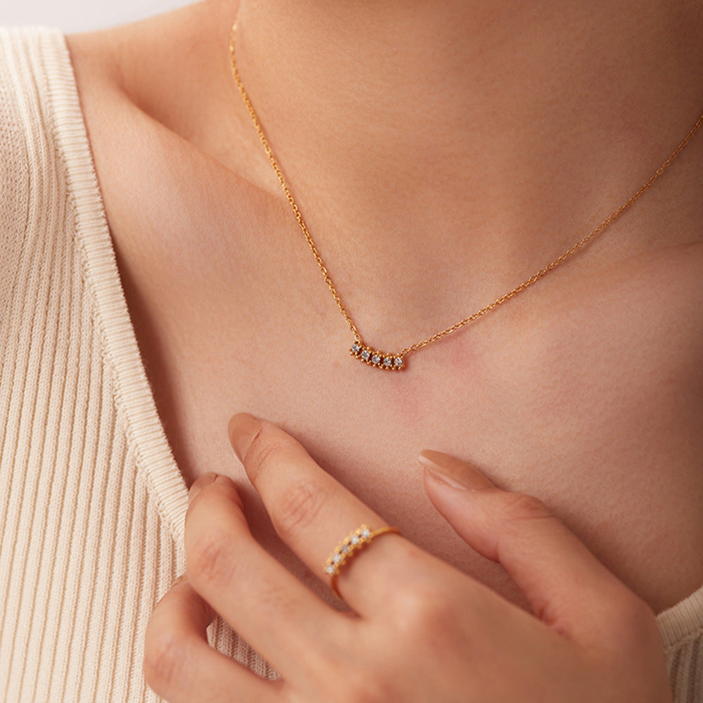 Timeless dainty pendant crafted with white zircon stones