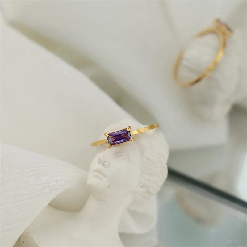 Designer index finger ring with purple and green zircon stones