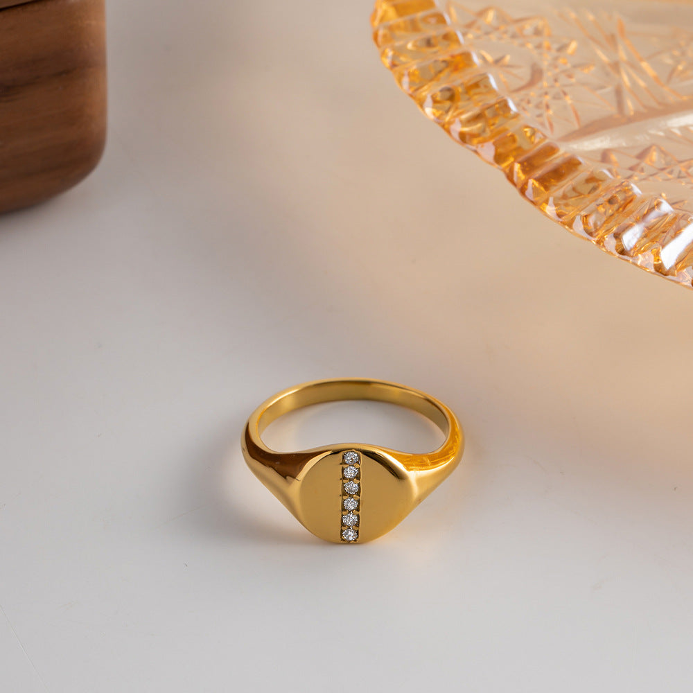 Gold-Plated Stainless Steel Rhinestone Ring - A dazzling accessory combining durability and glamour for timeless elegance.