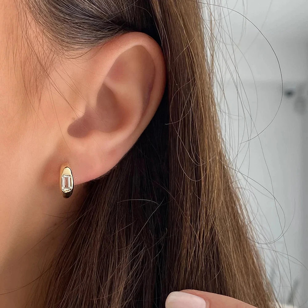 Elegant sterling silver earrings with square diamond design