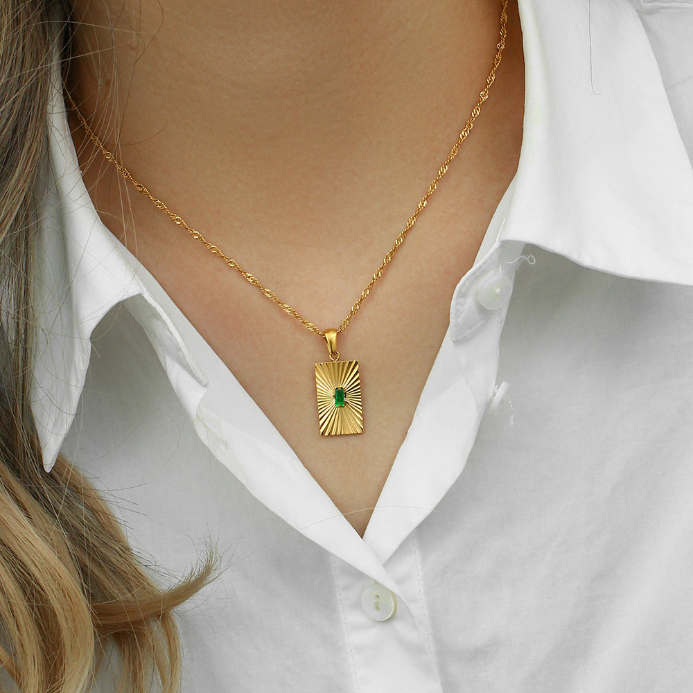 Stainless steel blossoming charm necklace with gold accents