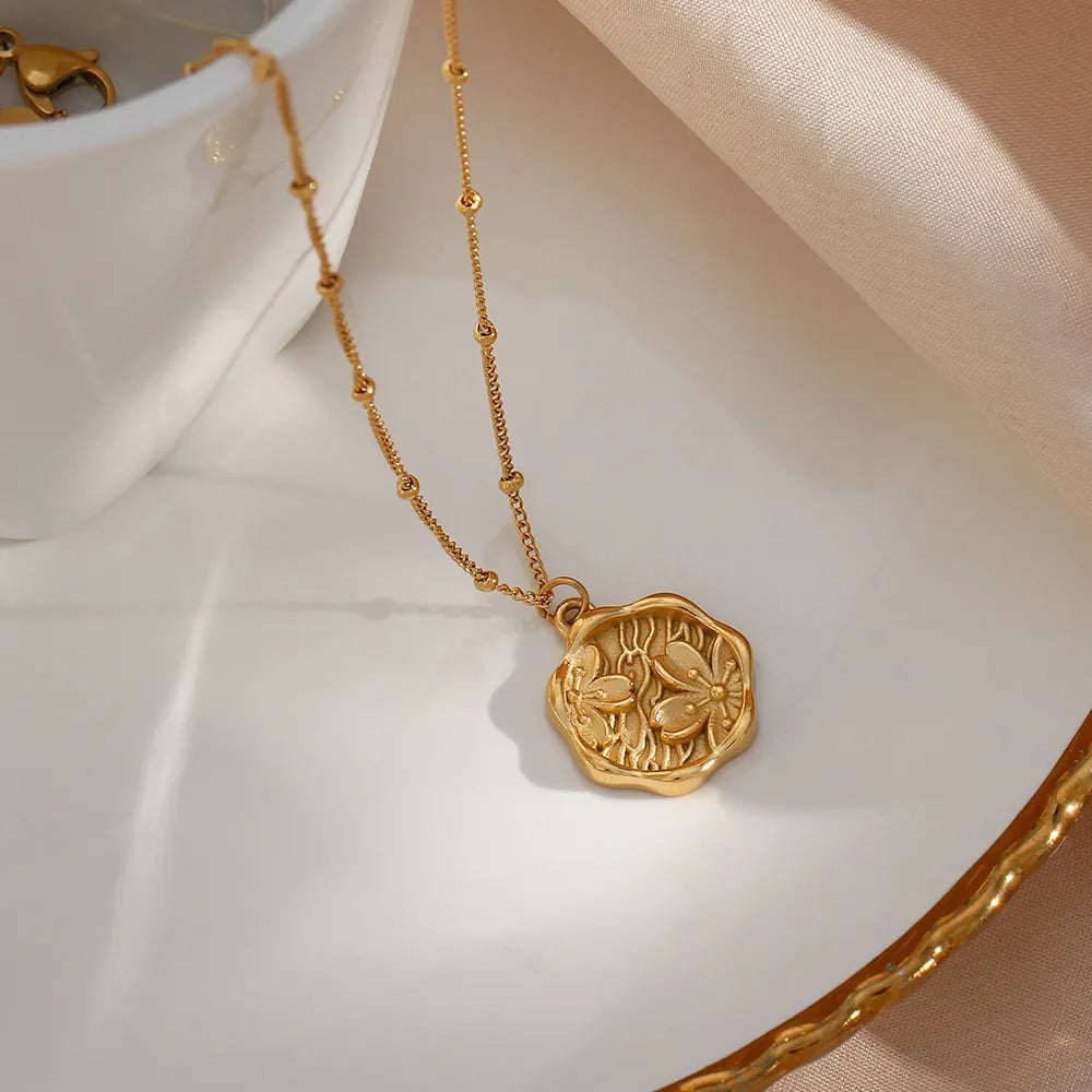 Women’s blossoming charm necklace stainless steel 18K gold accent