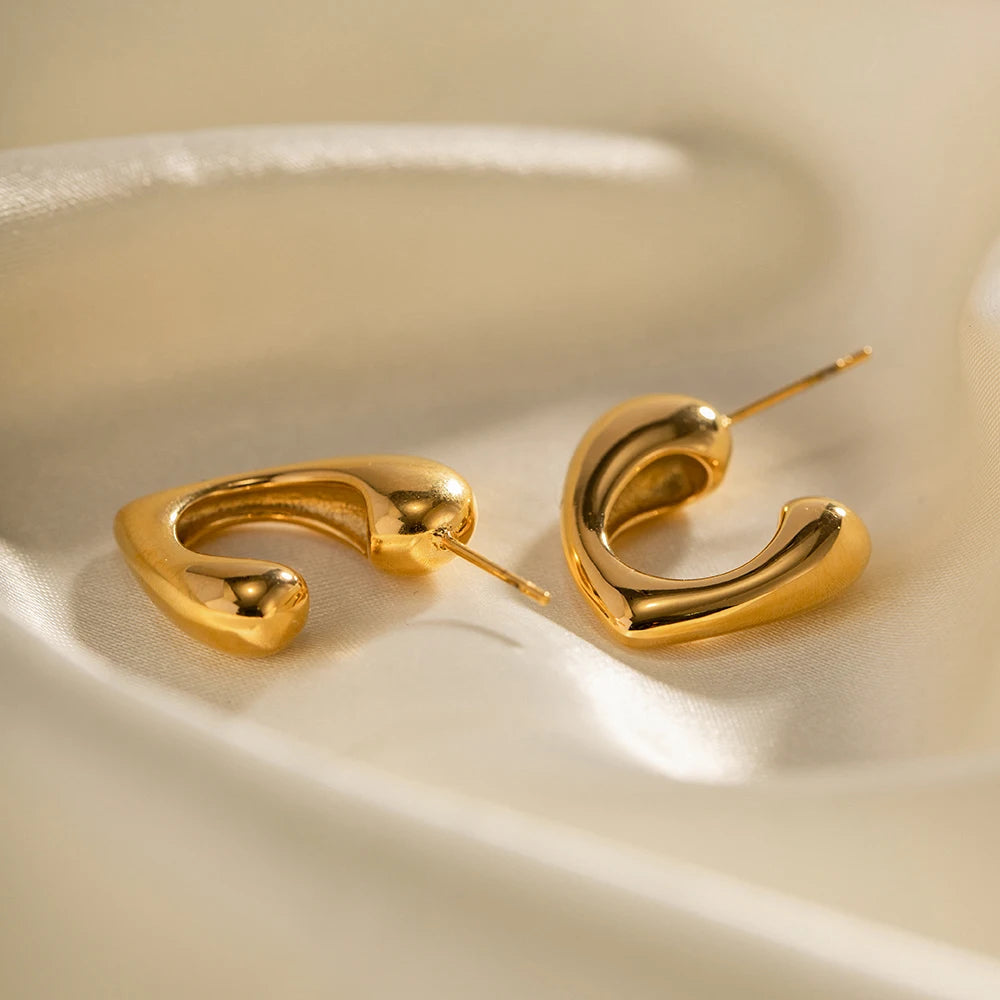 Timeless stainless steel hoop earrings with geometric heart design