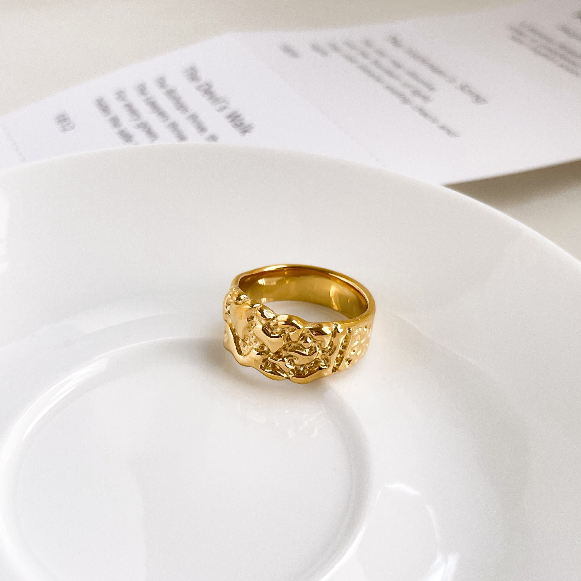 Gold-plated stainless steel lava ring, a radiant and unique accessory that effortlessly blends durability with modern opulence.