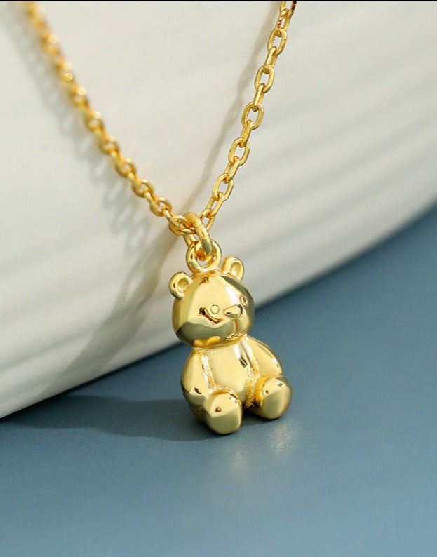 Dainty Gold Peace Bear Necklace - A harmonious blend of charm and tranquility, featuring a gold vermeil pendant on cable chains, adorned with a cute silver bear.