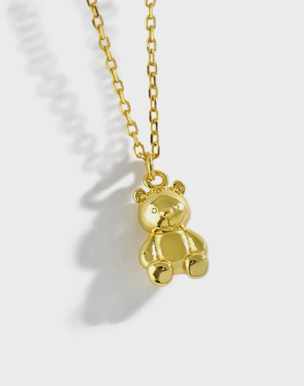 Dainty Gold Peace Bear Necklace - A harmonious blend of charm and tranquility, featuring a gold vermeil pendant on cable chains, adorned with a cute silver bear.