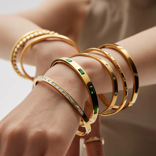 18K Gold Plated Stainless Steel Minimalist Stackable Bangle Bracelet - A timeless blend of durability and elegance, designed for the modern woman. Tarnish-free and stackable for versatile, polished style.