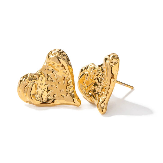 Shiny metallic love heart stud earrings with pleated 18K gold-plated stainless steel design.