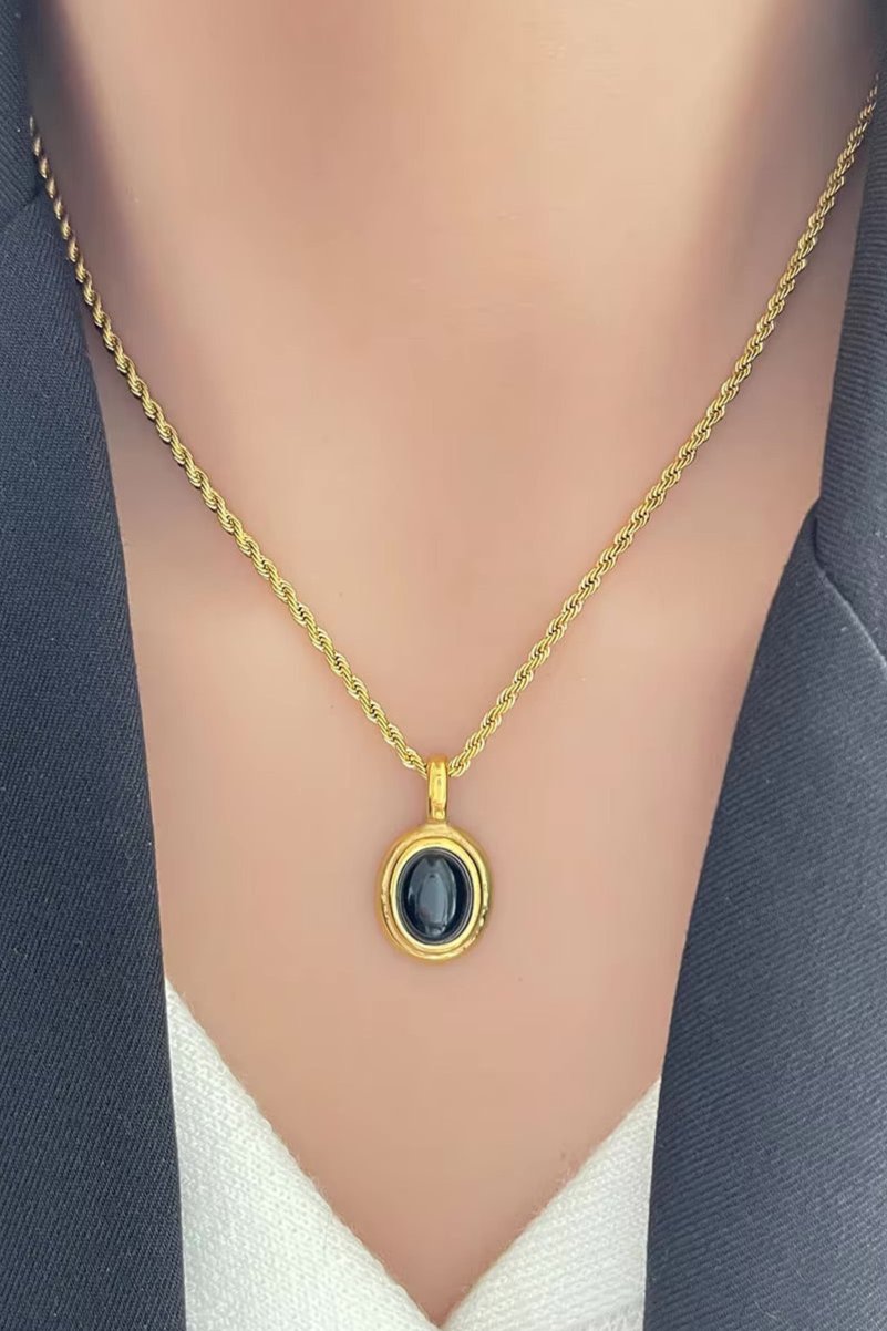 18K gold plated oval pendant necklace in stainless steel with minimalist design, perfect for layering or everyday wear.