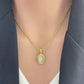 18K gold plated oval pendant necklace in stainless steel with minimalist design, perfect for layering or everyday wear.