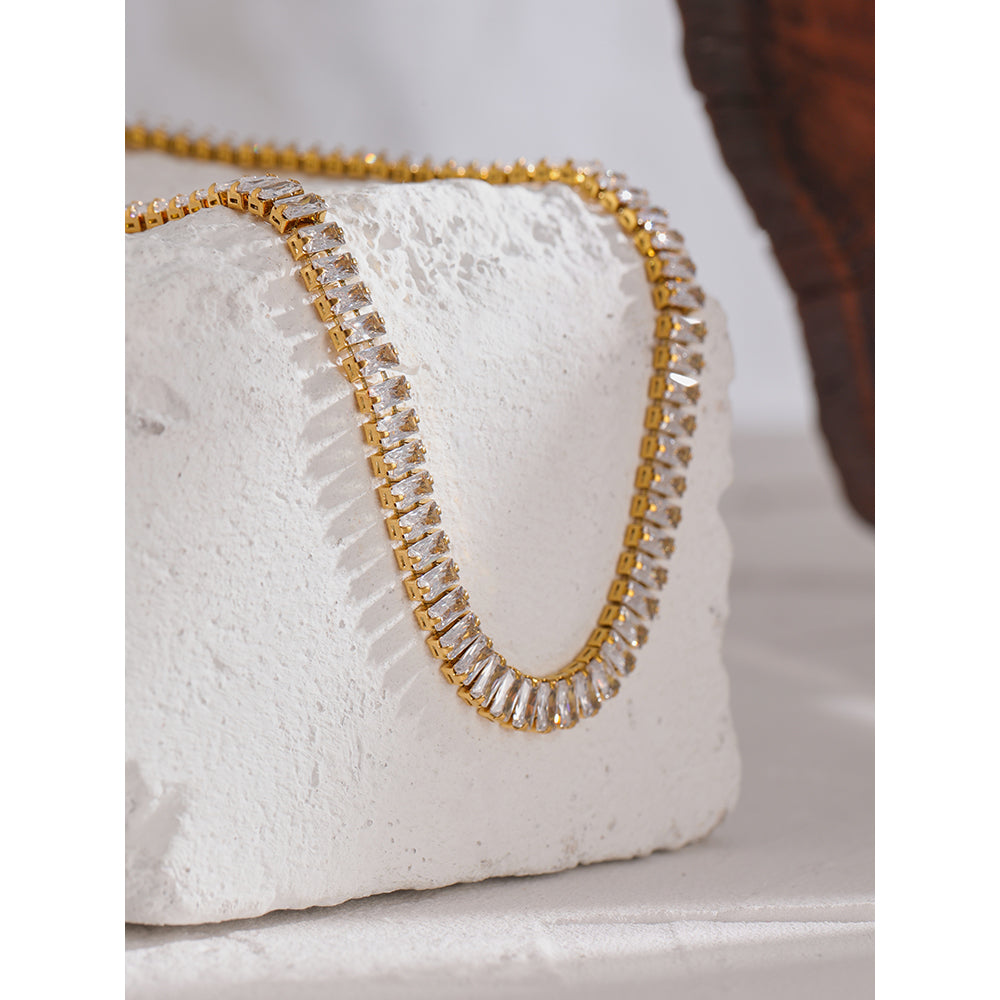 18K Gold Plated Stainless Steel Choker Necklace adorned with a shimmering full zircon chain—a blend of luxury and timeless elegance for the modern woman.