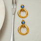 The Lumen Earrings zircon stud earrings gold Purajoia view 5
