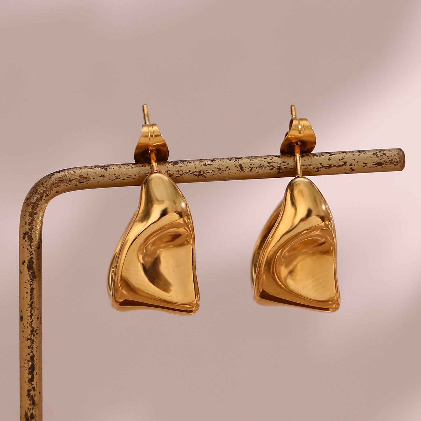 Chunky Wide Gold Hoops: Stainless Steel Earrings with 18k Gold Plating, a stylish and timeless accessory.