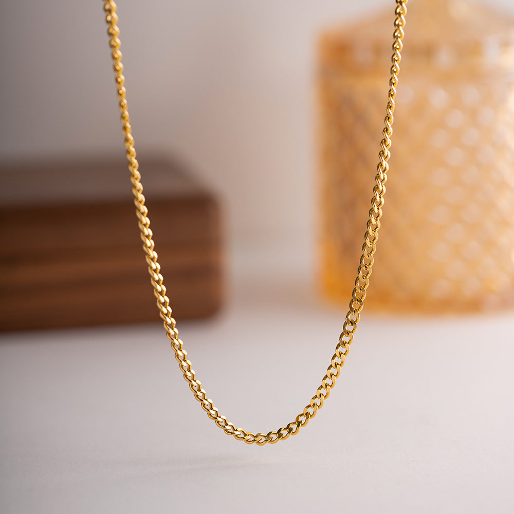 Gold-plated stainless steel thick Cuban chain, a bold and timeless accessory for a touch of opulence and enduring style.