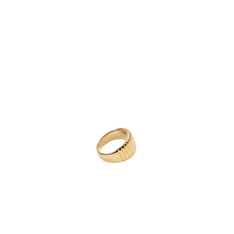 18K gold-plated stainless steel fashion ring, a gilded and versatile accessory that effortlessly combines durability with opulent style.