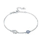 Sterling silver bracelet featuring a Blue Evil Eye Hamsa Hand charm adorned with Cubic Zirconia accents for a stylish and protective accessory