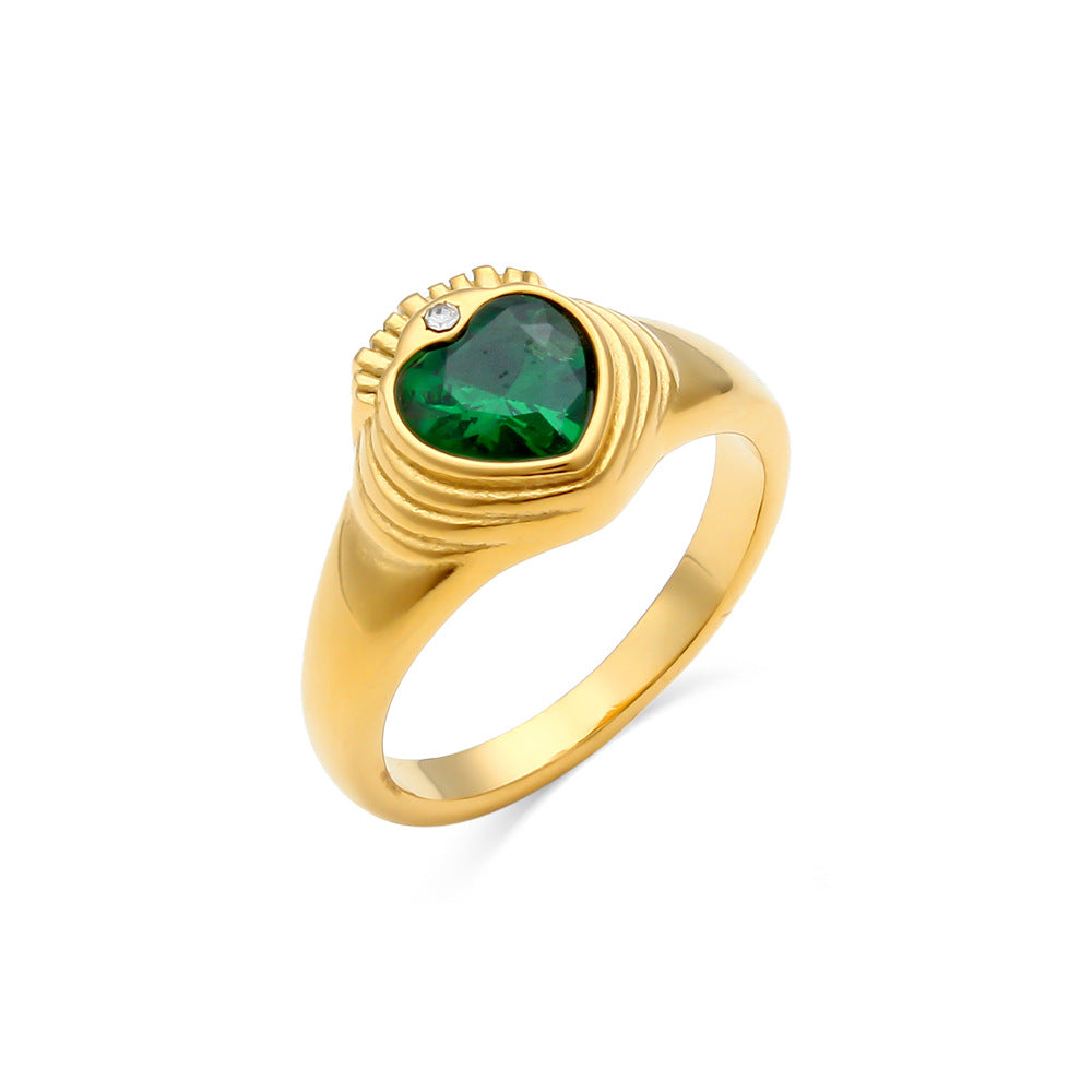 Shiny gold stainless steel ring adorned with colorful stones, a chic accessory for women.