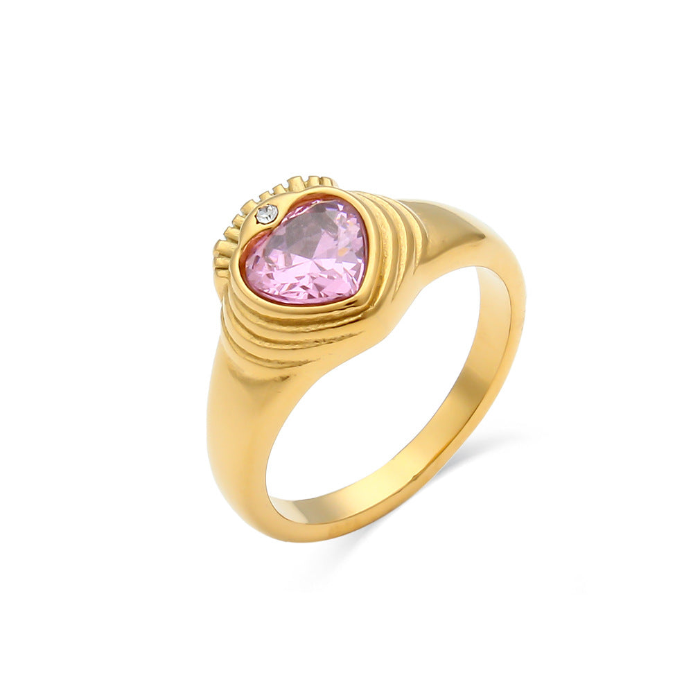 Shiny gold stainless steel ring adorned with colorful stones, a chic accessory for women.