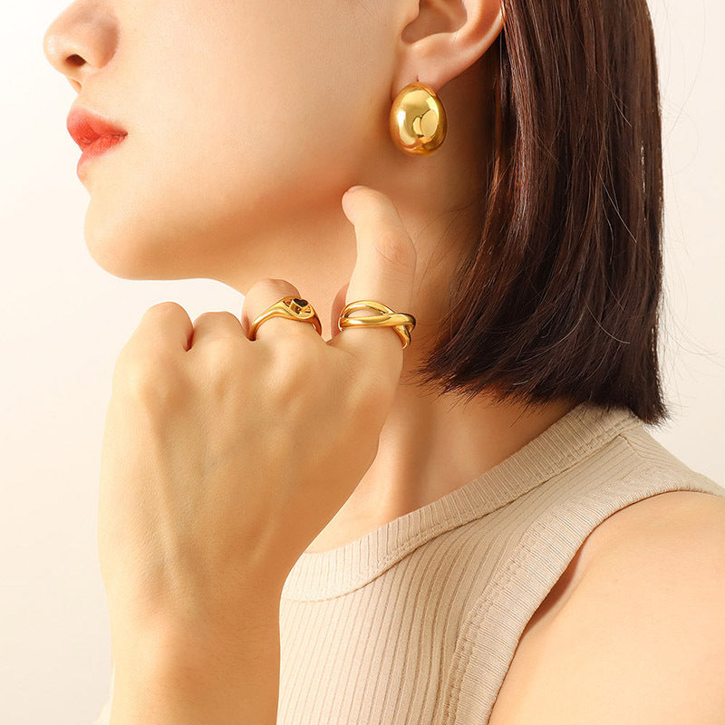 Stainless Steel CC Earrings with 18K gold plating, a perfect blend of elegance and modern style.