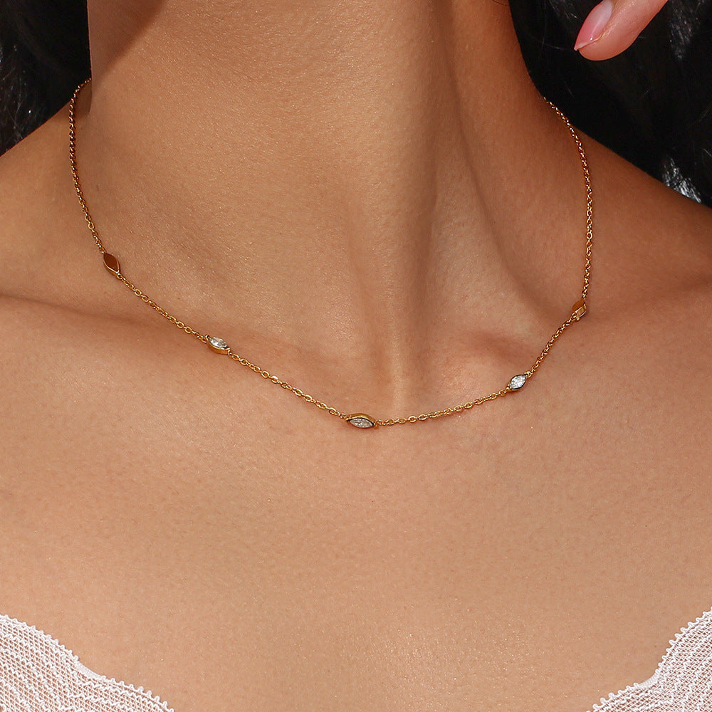 Simple and elegant, the 18K Plated Stainless Steel Zircon Necklace is a timeless accessory for women, adding a touch of sophistication to any ensemble.