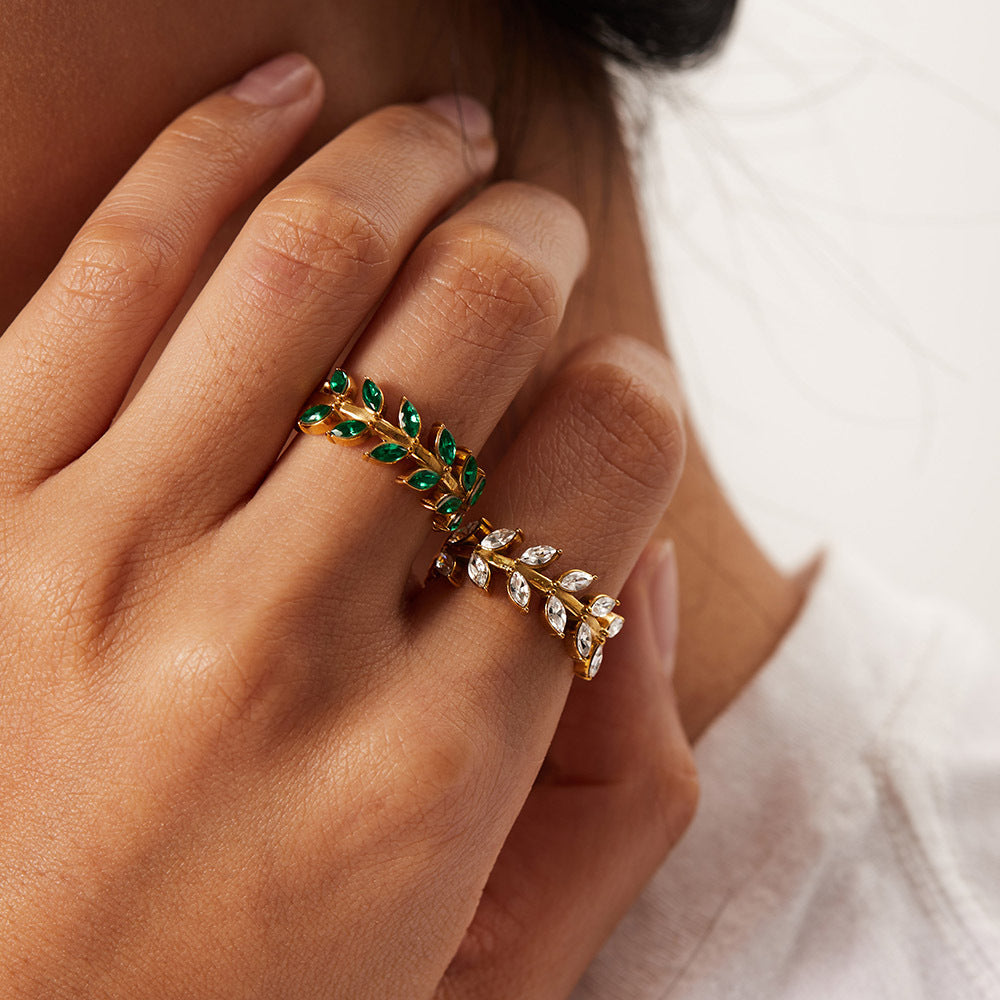 Stainless Steel Leaf-shaped Ring showcasing intricate white or green Zircon inlay, a sophisticated and nature-inspired accessory for any occasion.