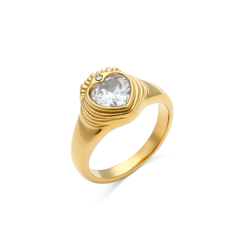 Shiny gold stainless steel ring adorned with colorful stones, a chic accessory for women.