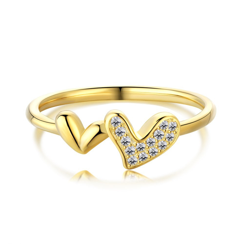 Sterling silver heart-shaped ring with intricate niche design, a timeless symbol of love and elegance