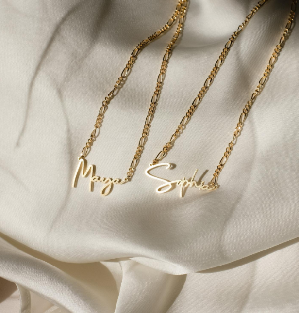 Elevate your style with our Custom Name Necklace featuring a chic Figaro chain—a timeless and personalized accessory that adds a touch of elegance to your look.