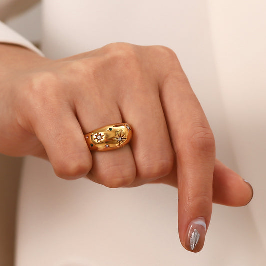 Minimalist gold dome band ring for women, crafted from durable stainless steel, offering timeless elegance.