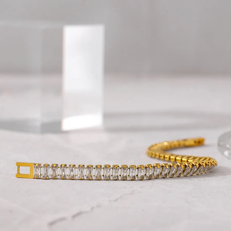 Gold Diamond Bracelet featuring Cubic Zirconia stones, a shimmering accessory for a touch of timeless glamour.