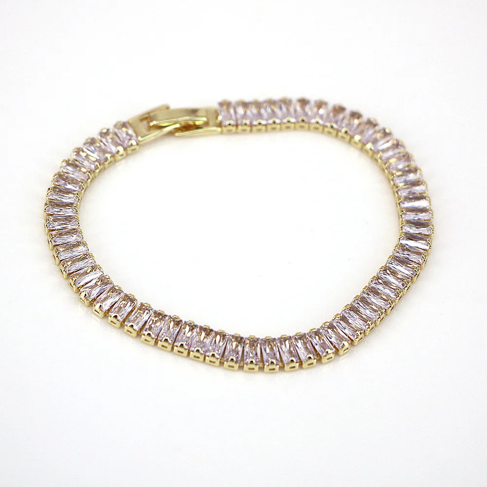 Gold Diamond Bracelet featuring Cubic Zirconia stones, a shimmering accessory for a touch of timeless glamour.