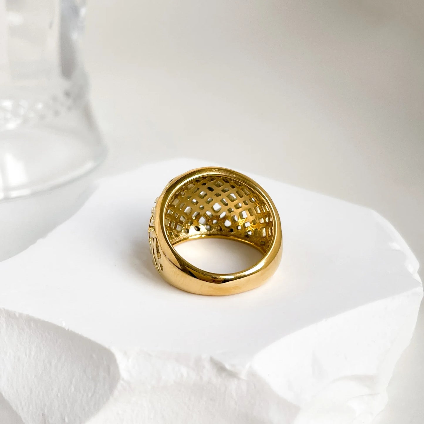 Elegant stainless steel gold-plated braid ring, a harmonious blend of durability and opulence with an intricate design for timeless sophistication.