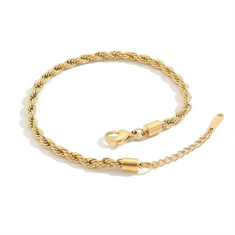 Twist Bracelet in Gold, a trendy and versatile addition to your collection - perfect for stacking and layering.