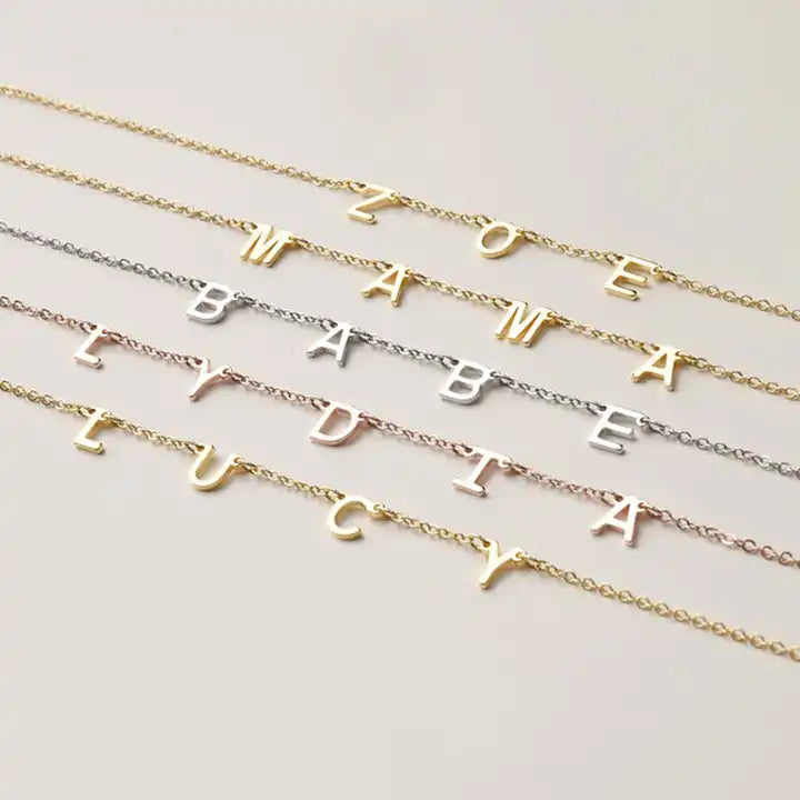 Timeless stainless steel letter necklace—personalized elegance with a meaningful touch.