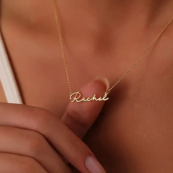 levate your style with our Stainless Steel Custom Signature Necklace—a chic and personalized nameplate jewelry piece for women, blending elegance and individuality effortlessly.