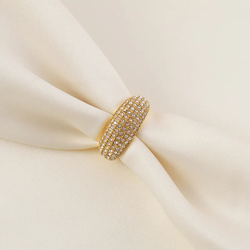 Victoria Dome Ring : Dazzling Cubic Zirconia stones create a luxurious and glamorous effect, perfect for a stand-alone classy look or stacked for added elegance.