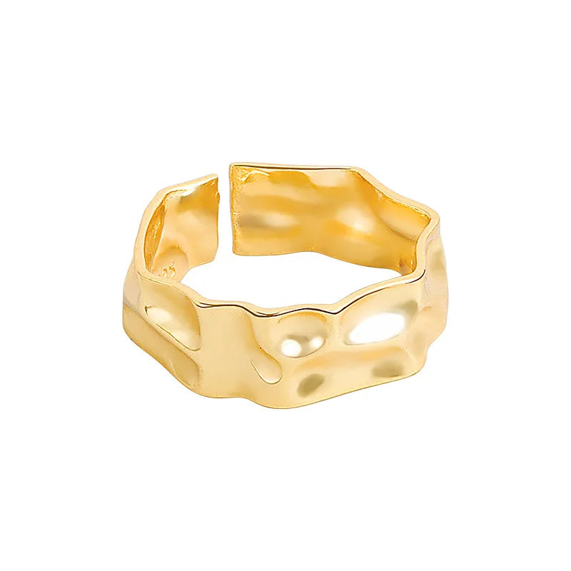 Chunky Gold and Silver Hammered Ring - A contemporary statement piece blending boldness and versatility with a distinctive hammered texture