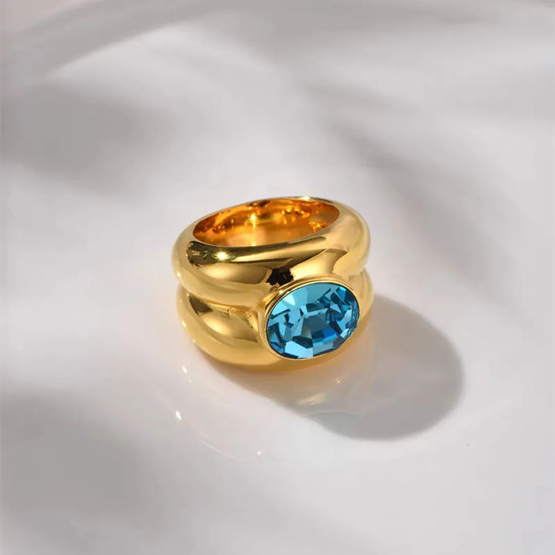 Close-up of Stainless Steel 18K Gold Plated Blue Stone Double Layered Rings for Women