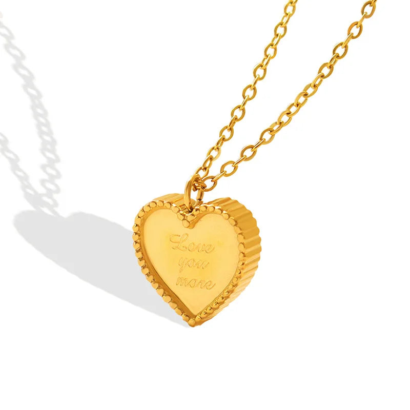 Gold stainless steel heart necklace on a delicate chain, showcasing timeless elegance and durability in a sophisticated accessory.