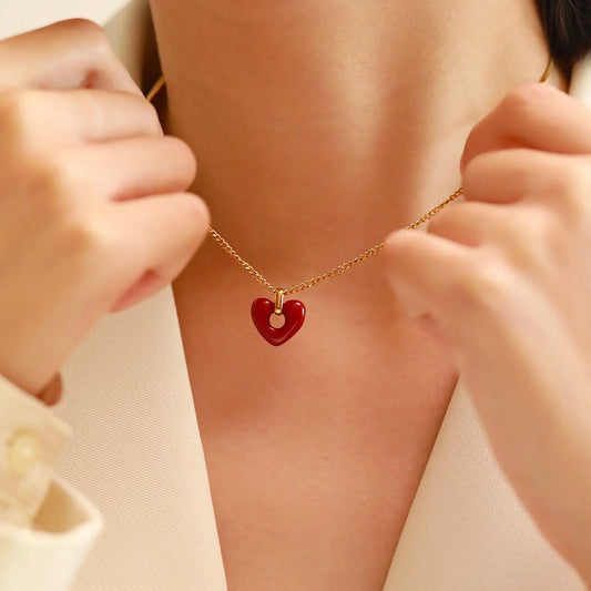 Enhance your style with the timeless allure of our stainless steel Heart-shaped Red Agate Pendant—a captivating and enduring accessory for women.