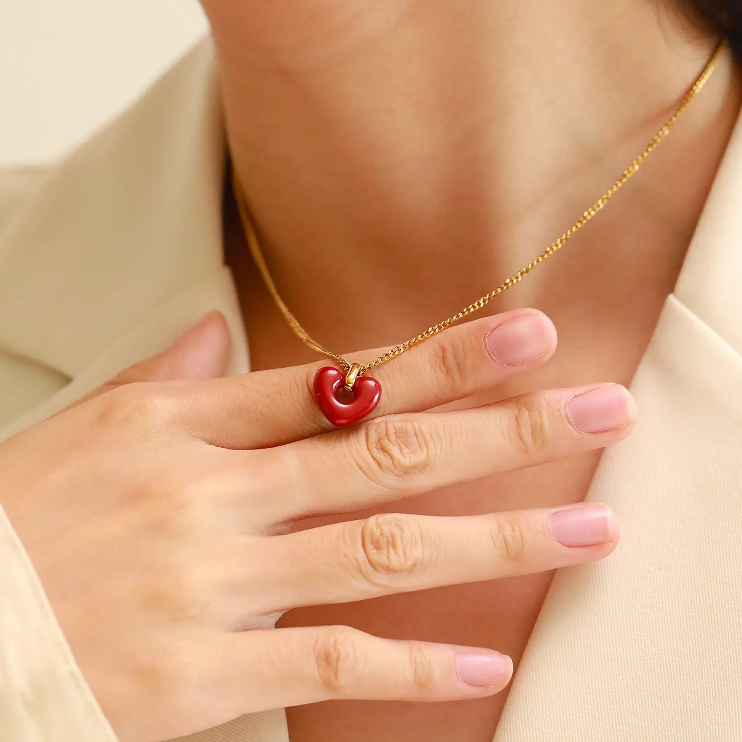 Enhance your style with the timeless allure of our stainless steel Heart-shaped Red Agate Pendant—a captivating and enduring accessory for women.