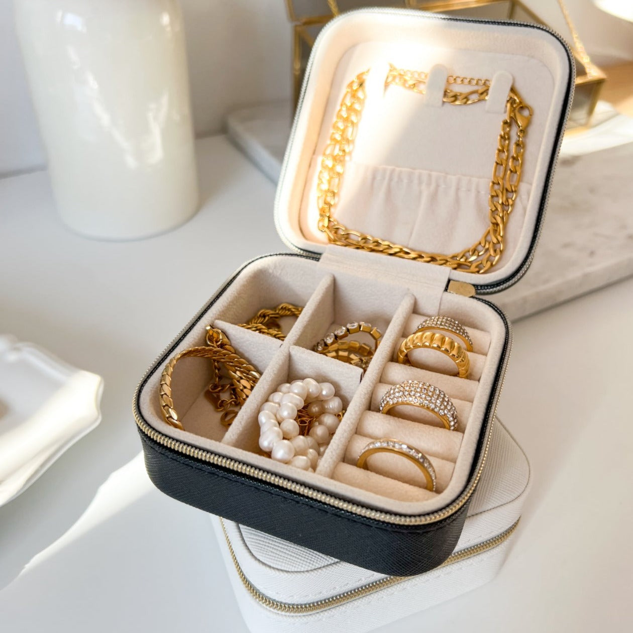 Premium leather jewelry travel case with secure compartments for organized storage, combining style and functionality for on-the-go elegance.