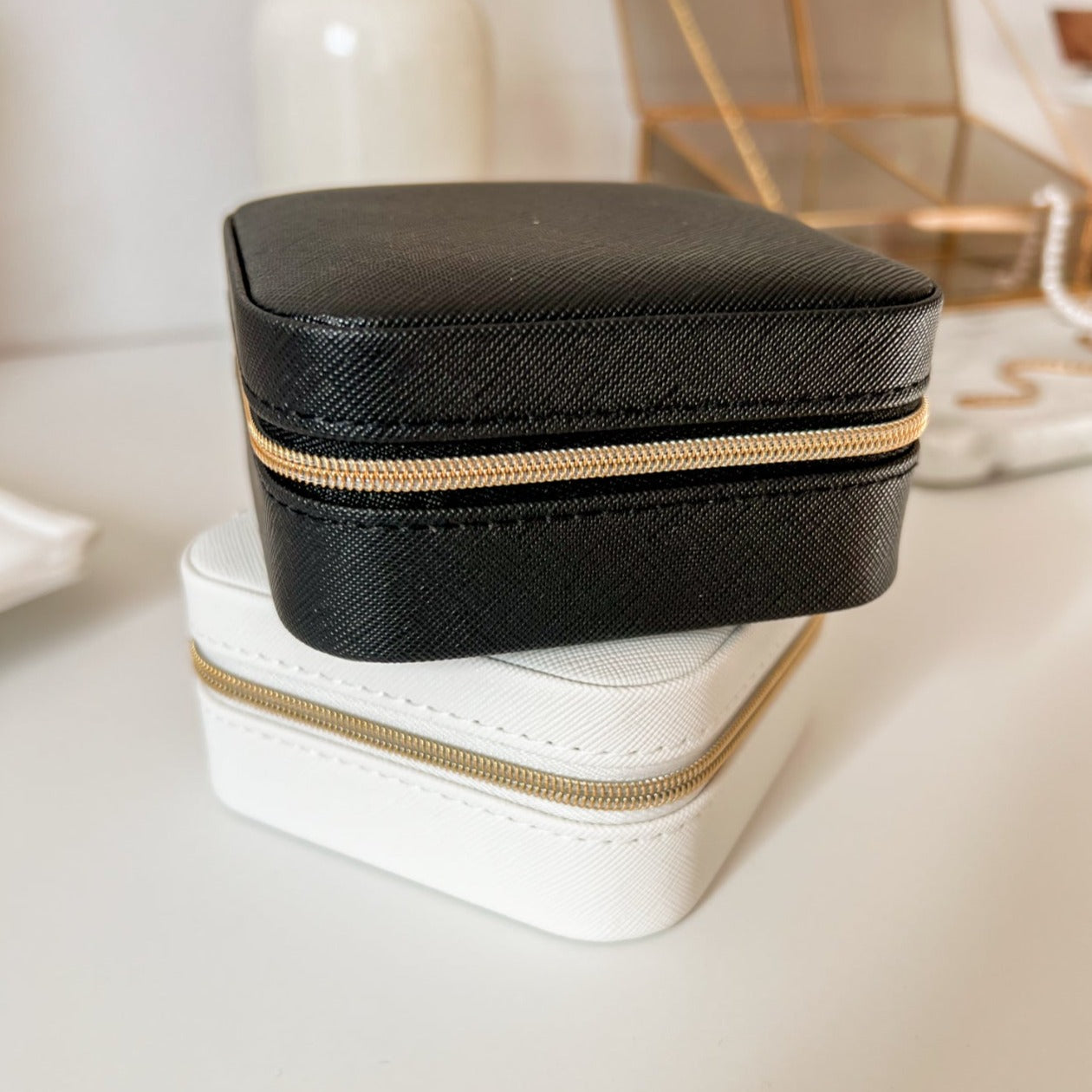 Premium leather jewelry travel case with secure compartments for organized storage, combining style and functionality for on-the-go elegance.