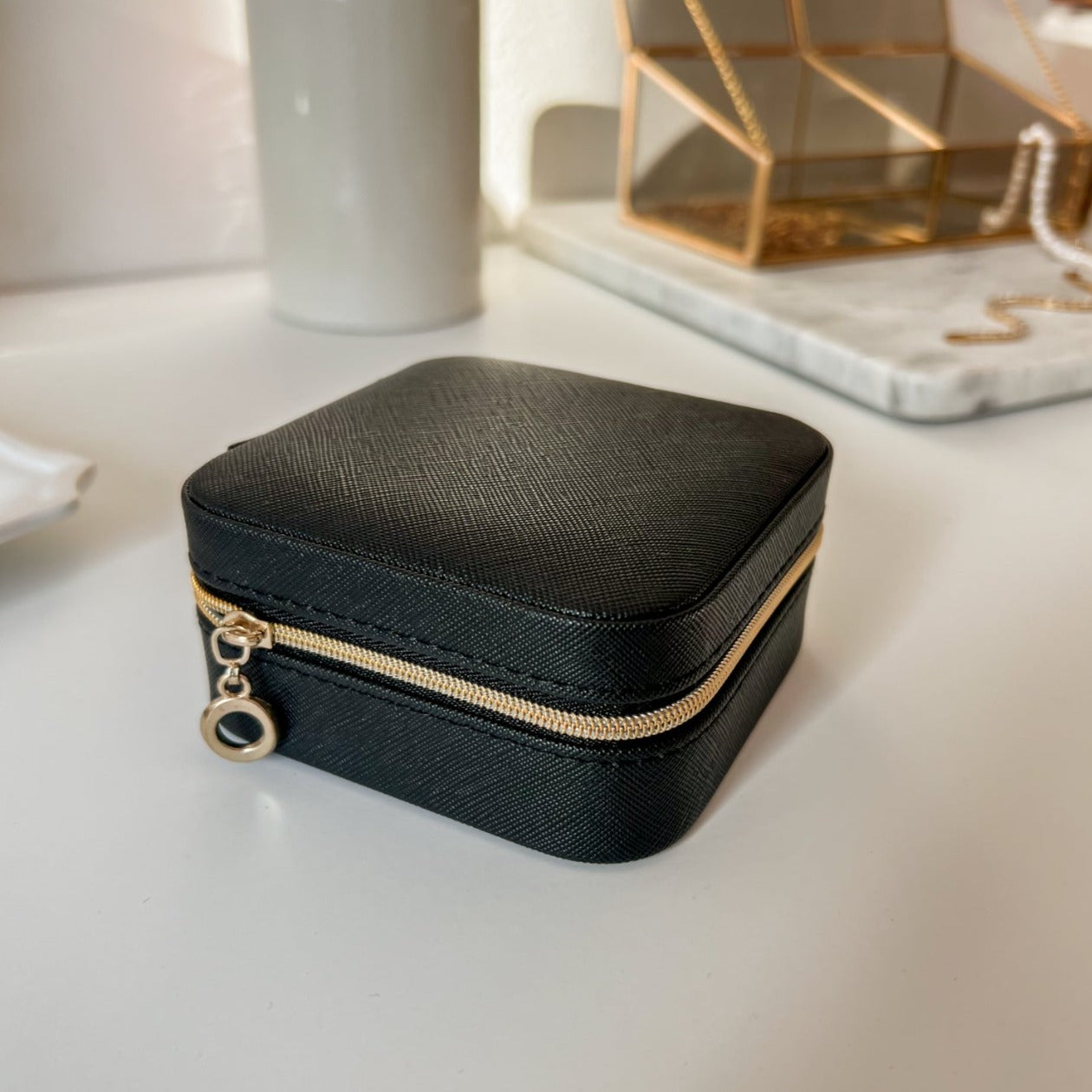 Premium leather jewelry travel case with secure compartments for organized storage, combining style and functionality for on-the-go elegance.