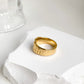 Gold-plated stainless steel lava ring, a radiant and unique accessory that effortlessly blends durability with modern opulence.