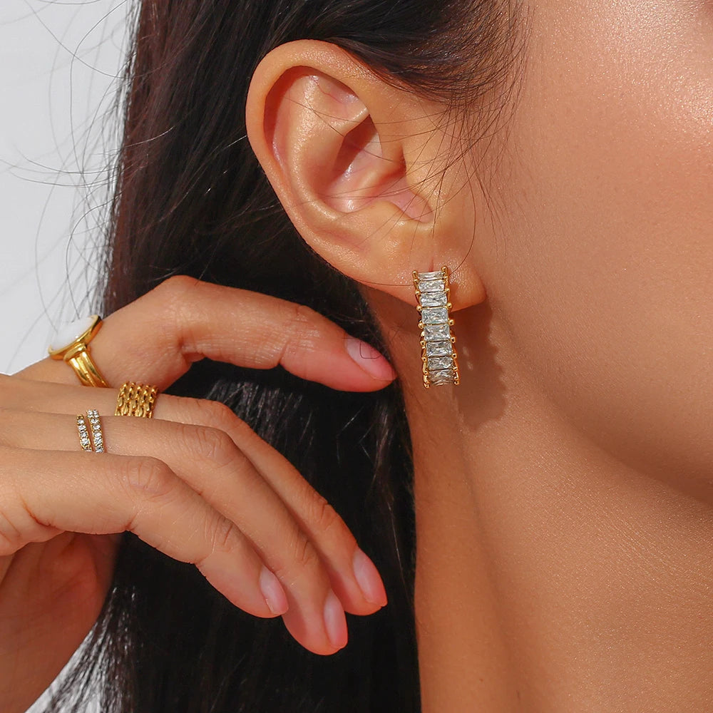 Handmade stainless steel hoop earrings adorned with clear zircon stones, adding a touch of radiance and sophistication to your accessory collection