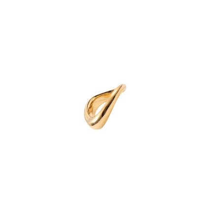 Curved gold band ring on woman's finger — PURAJOIA